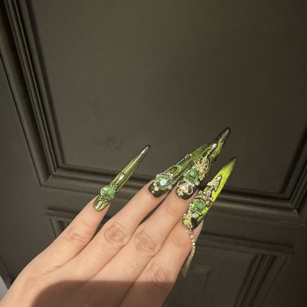 Green Cat Eye Stiletto Press-on Nails with 3D Crown, Crystal Rhinestone, and Chain Charms - Luxury Goth Fake Nail Set