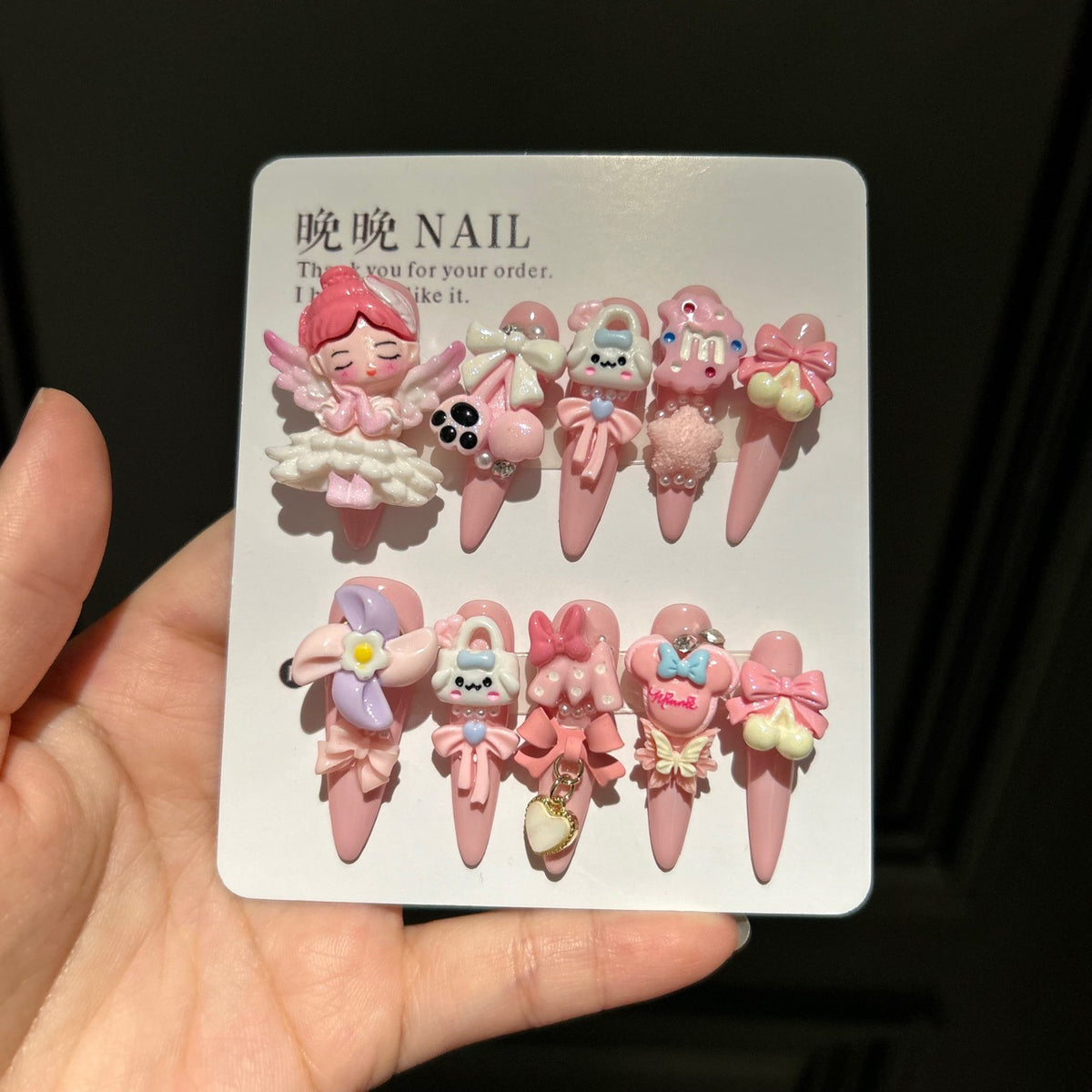 Handmade Baby Pink Long Stiletto Press On Nails with 3D Angel Doll, Cute Cartoon Charms, Bows & Heart Chain Tassels