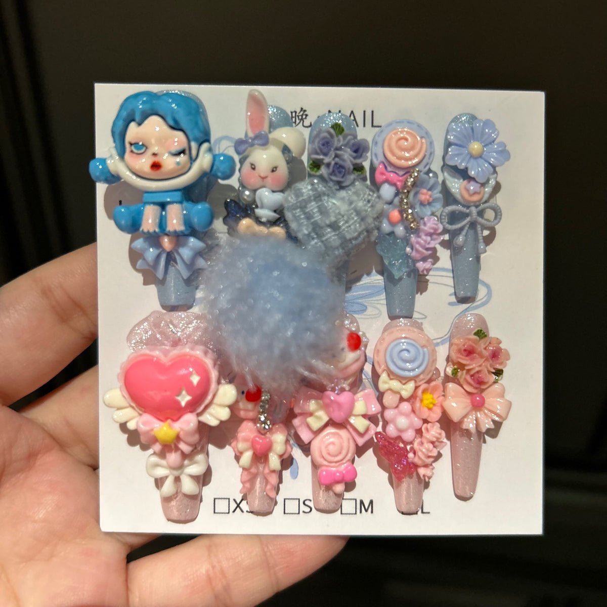 Y2K Blue and Pink Coffin Press-on Nails with 3D Anime Doll, Fluffy Pom-Pom, Lollipop, and Cute Cartoon Charms - Sweet & Cool Fake Nail Set