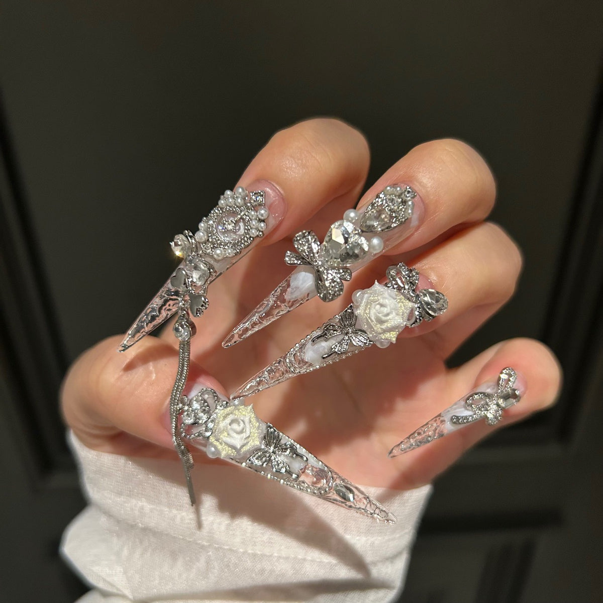 Handmade Clear Transparent Long Stiletto Press On Nails with 3D White Roses, Silver Rhinestone Bows, Crown & Butterfly Charms, Pearls & Dangling Silver Chains
