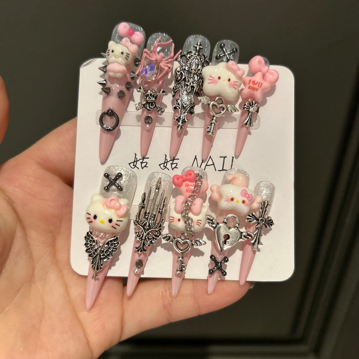 Handmade Pink Gothic Hello Kitty Long Stiletto Press On Nails with Spikes, Cross & Wing Charms