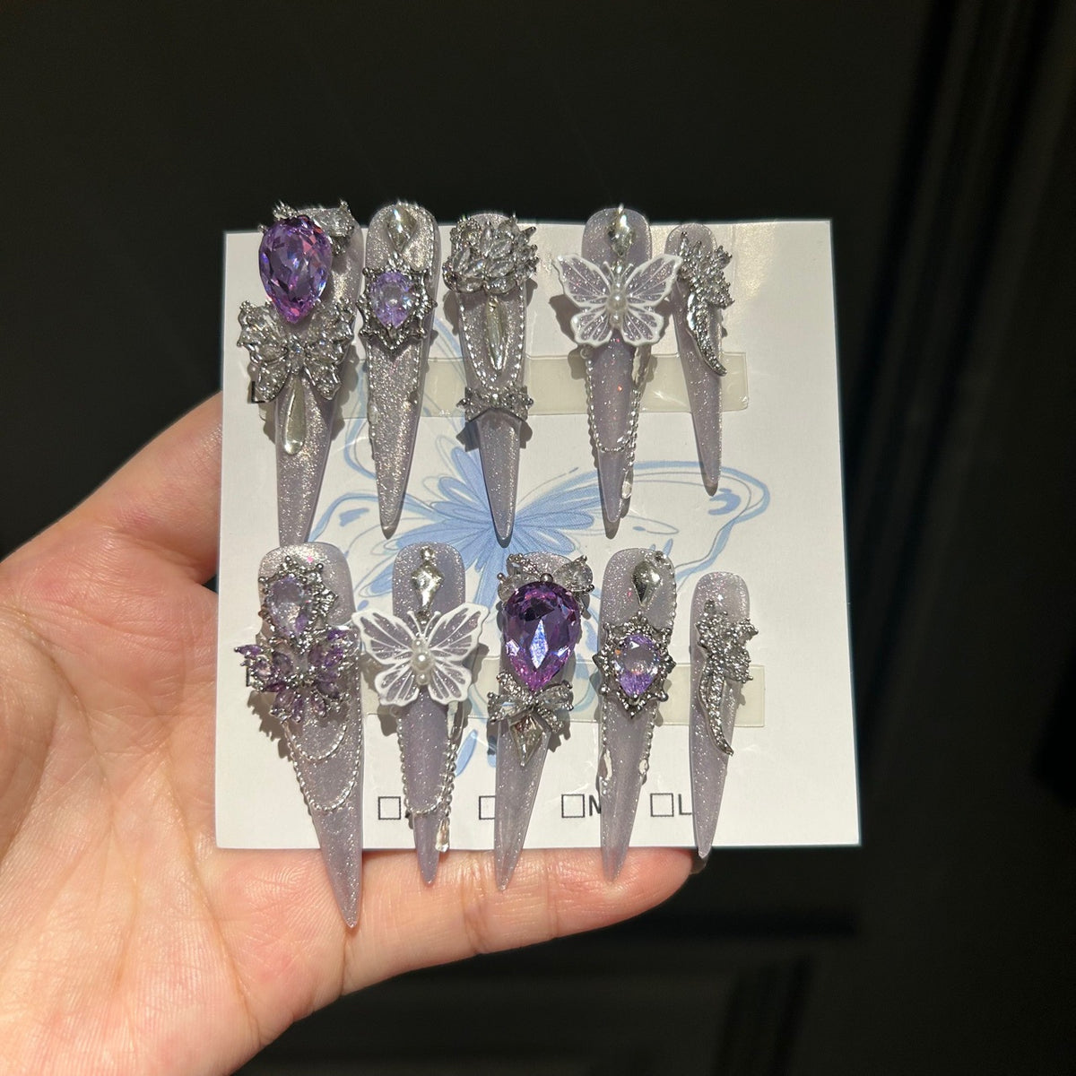 Smoky Purple Cat Eye Stiletto Press-on Nails with Over-sized Purple Crystal, White Bowknot, and Beaded Chain - Luxury Fairy Fake Nail Set