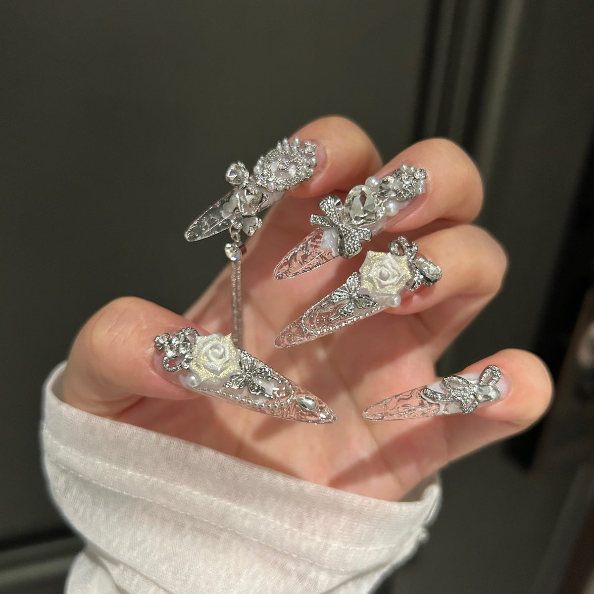 Handmade Clear Transparent Long Stiletto Press On Nails with 3D White Roses, Silver Rhinestone Bows, Crown & Butterfly Charms, Pearls & Dangling Silver Chains