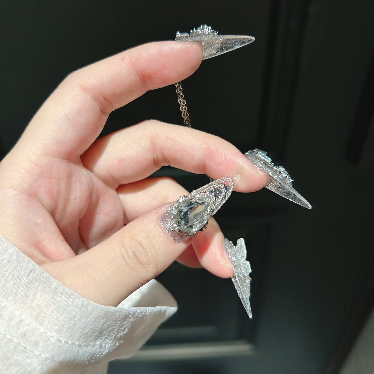 Handmade Silver Glitter Clear Long Stiletto Press On Nails with 3D White Butterfly Charms, Large Heart Crystals, Rhinestone Bows & Dangling Chains