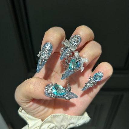 Ice Blue Cat Eye Stiletto Press-on Nails with 3D Blue Crystal Gem, Pearls, Bowknot, and Hanging Chain Charms - Luxury Statement Fake Nail Set