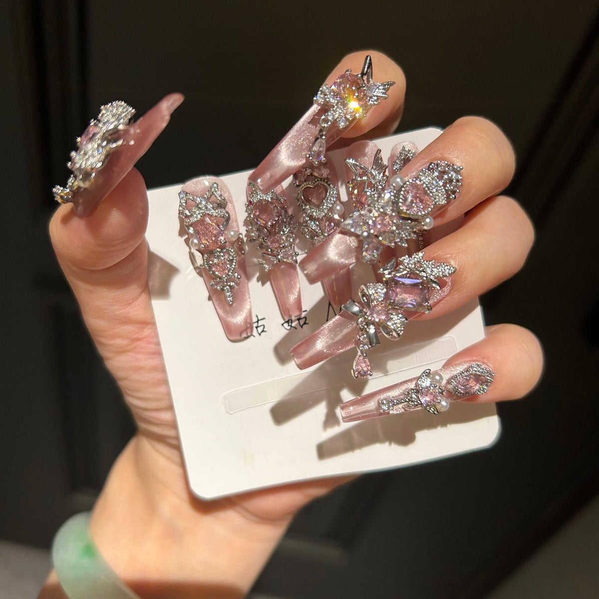 Handmade Pink Cat Eye Long Coffin Press On Nails with Pink Heart Crystals, Crown & Cross Rhinestone Ornaments, Pearl Accents & Dangling Charms
