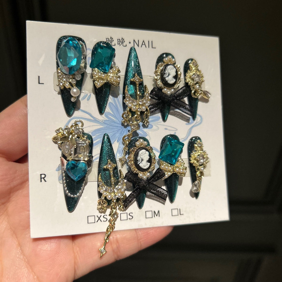 Handmade Teal Cat Eye Long Stiletto Press On Nails with Giant Blue Crystals, Vintage Cameo, Gold Filigree & Black Bows