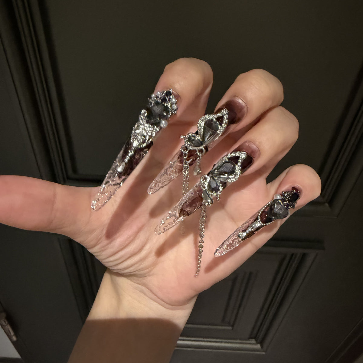 Handmade Dark Brown Smoky Long Stiletto Press On Nails, Gothic Black Butterfly False Nails with Heart Gems, Pearls & Dangling Chains