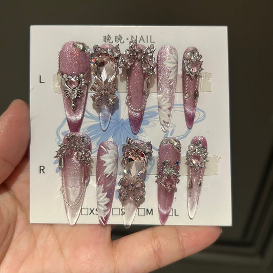Handcrafted Designer Pink Press-on Nails - Shimmering Cat Eye Base with Intricate 3D Floral, Rhinestones and Chain Drops