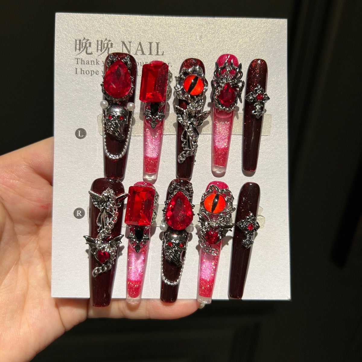 Handcrafted Designer Dark Aesthetic Press-on Nails - Shimmering Red-Black Base with Heavy 3D Gemstones, Skull Art and Cross Decals