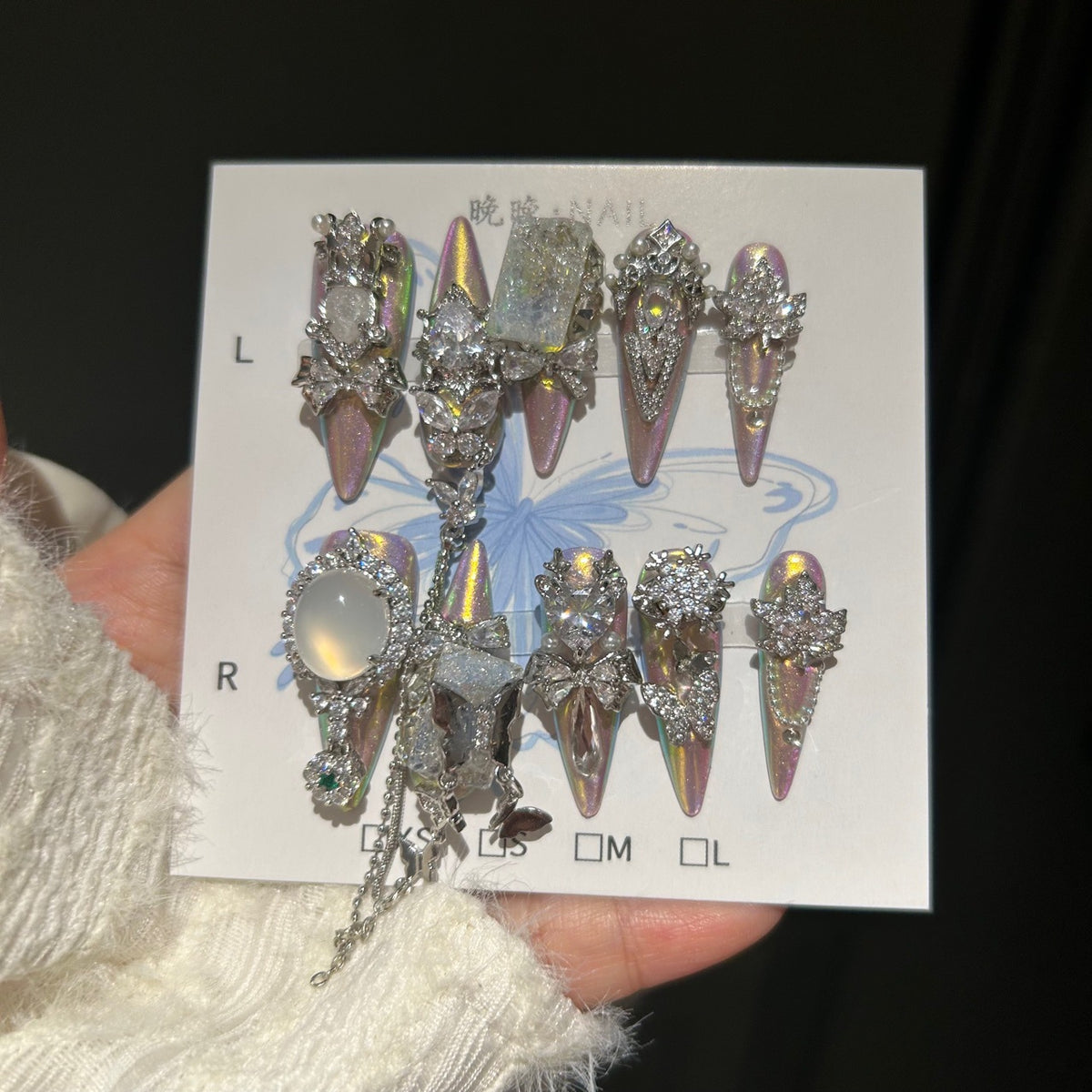 Handmade Iridescent Aurora Long Stiletto Press On Nails with Opal Gem Accents, Silver Rhinestone Bow & Star Charms, Pearls & Long Dangling Chains