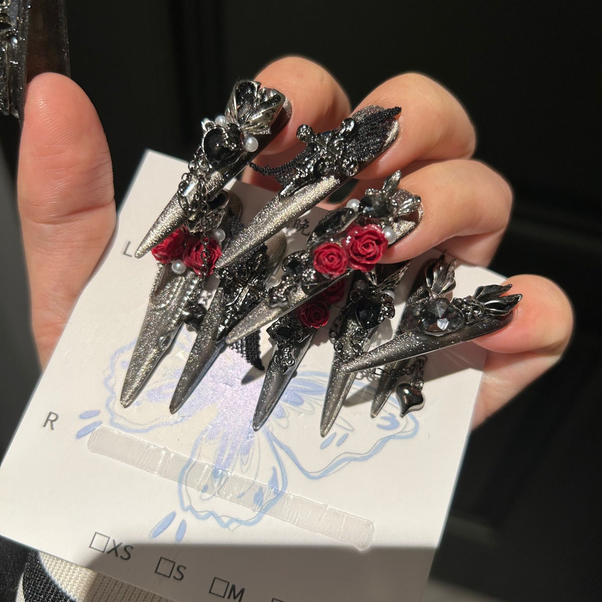 Handmade Silver Glitter Press On Nails, Long Stiletto Gothic Vampire False Nails with 3D Red Roses, Skeleton Hand, Cross & Skull Charms, Black Lace, Pearls, Black Gems & Dangling Metal Chains, Reusable Fake Nails for Cosplay, Halloween & Party