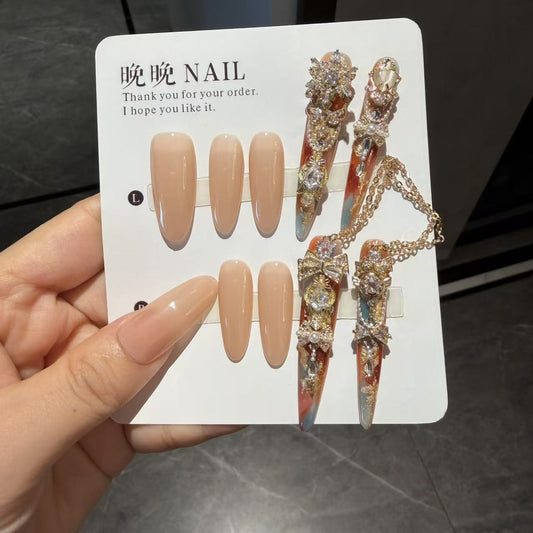 Nude and Vintage Gradient Press-on Nails with 3D Gold Bowknot, Rhinestone, and Hanging Chain Charms - Luxury Fake Nail Set