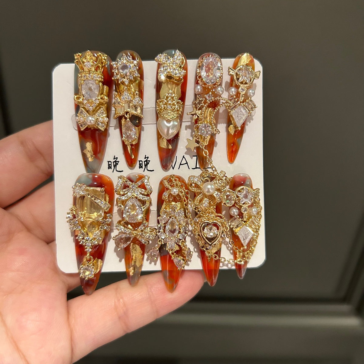 Handmade Amber Marble Long Stiletto Press On Nails with Gold Filigree, Crown & Large Crystal Charms