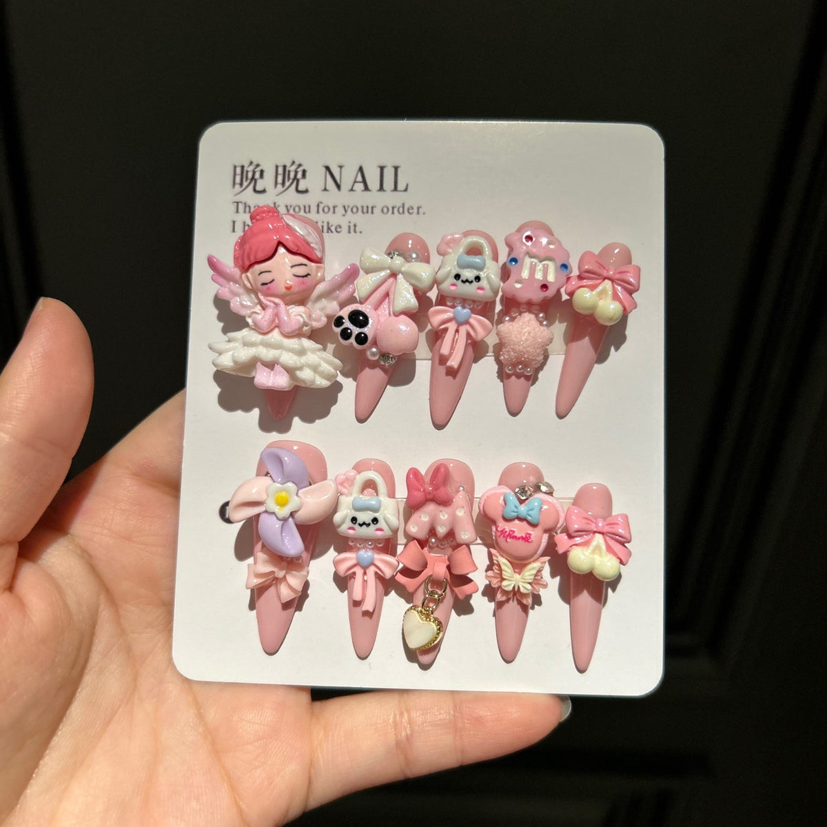 Handmade Baby Pink Long Stiletto Press On Nails with 3D Angel Doll, Cute Cartoon Charms, Bows & Heart Chain Tassels
