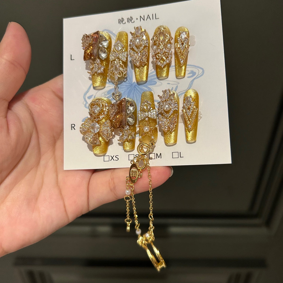 Gold Cat Eye Coffin Press-on Nails with 3D Bowknot, Crystal Rhinestones, and Connected Finger Ring Chain - Luxury Statement Fake Nail Set
