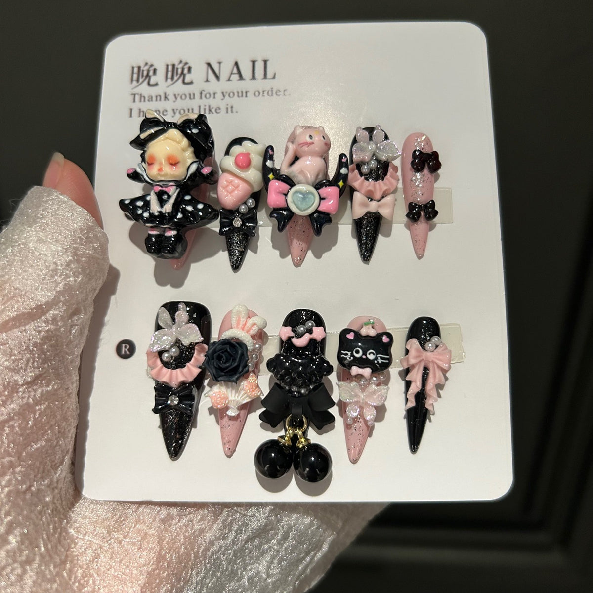Gothic Black & Pink Cat Eye Stiletto Press-on Nails with 3D Doll Figurine, Black Rose, Cute Cat, Folding Fan, and Cherry Charm - Y2K Sweet Cool Fake Nail Set