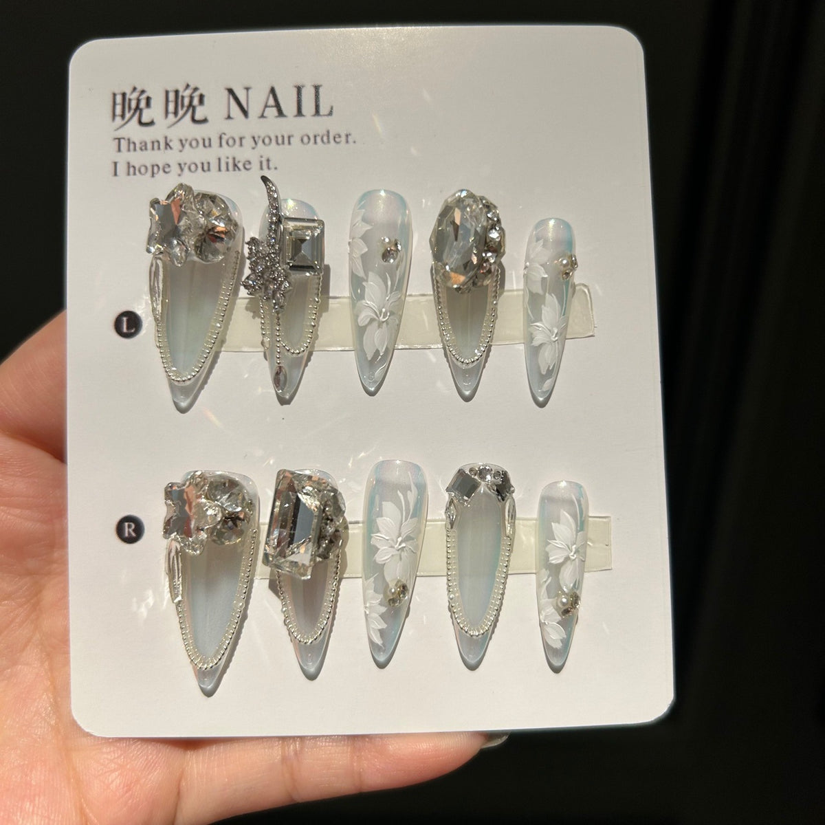 Holographic White Cat Eye Stiletto Press-on Nails with 3D Sculpted Floral, Crystal Jewels, and Pearl Beaded Chain - Luxury Fairy Fake Nail Set
