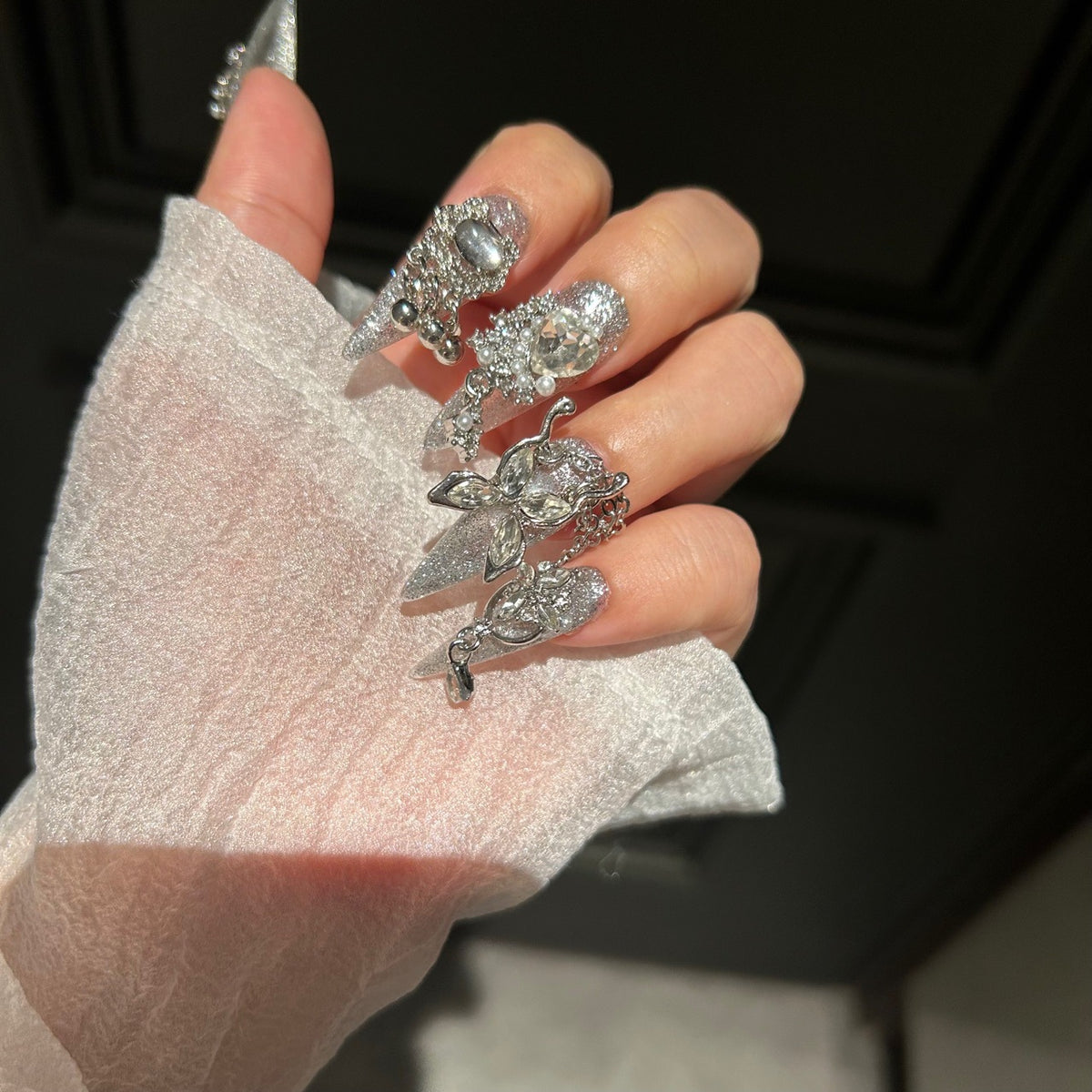 Handcrafted Designer Silver Press-on Nails - Shimmering Cat Eye Base with Heavy 3D Crystals, Pearls and Interconnected Chains