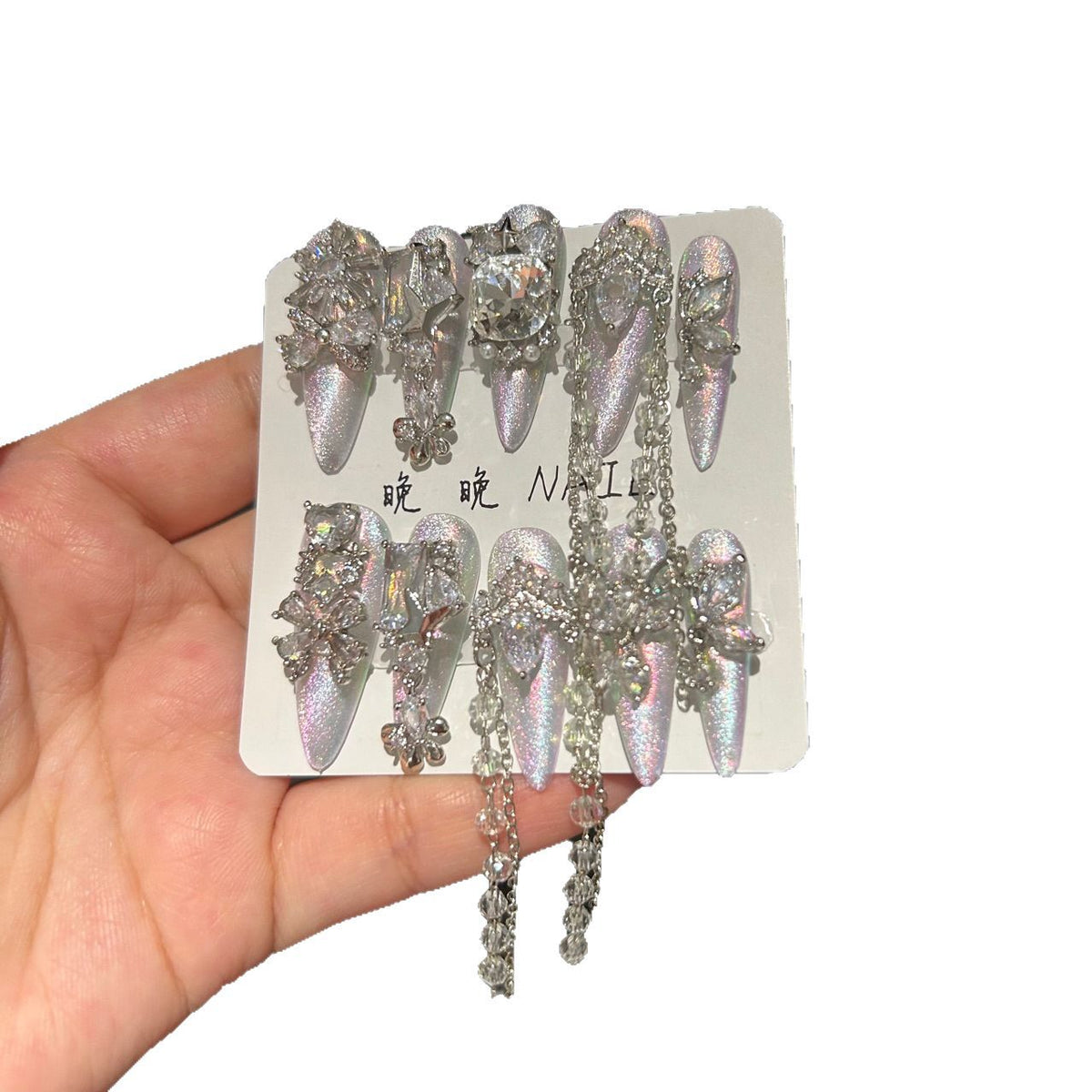 Holographic Silver Cat Eye Stiletto Press-on Nails with 3D Crystal Rhinestones, Over-sized Gem, and Beaded Hanging Chain Charms - Luxury Statement Fake Nail Set