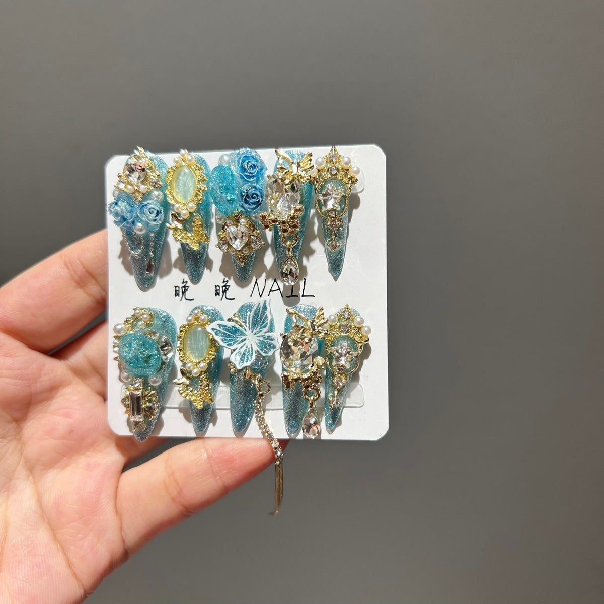 Handmade Turquoise Glitter Long Stiletto Press On Nails with 3D Blue Roses, Lace Butterfly, Gold Frame Charms & Dangling Chains