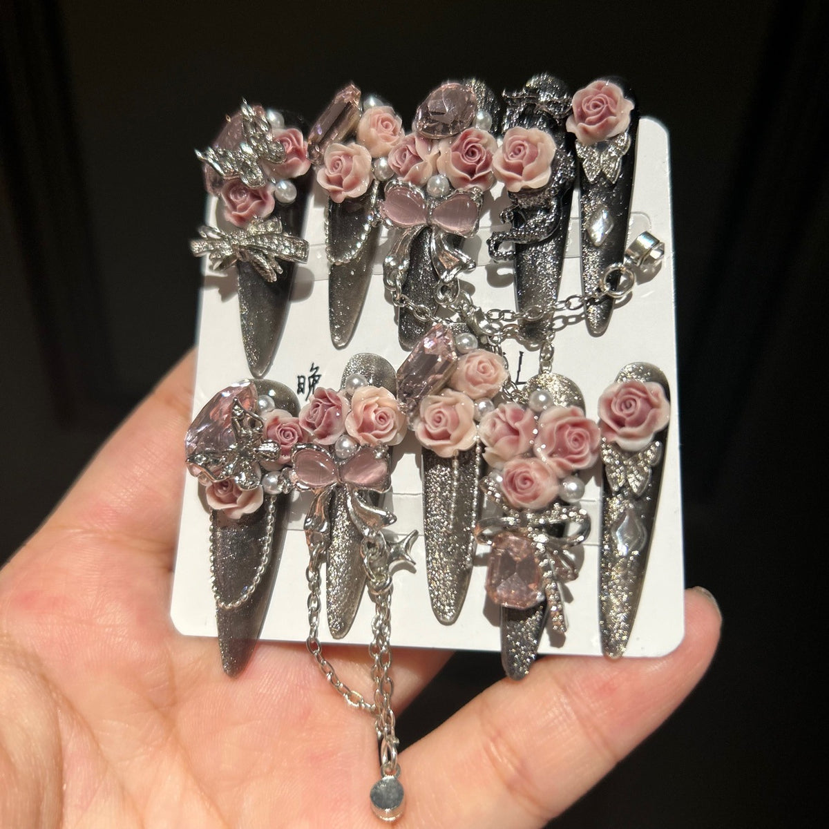 Handmade Dark Glitter Long Stiletto Press On Nails with 3D Dusty Pink Roses, Pink Crystal Charms, Bows, Butterfly Rhinestones & Interlinked Silver Chains