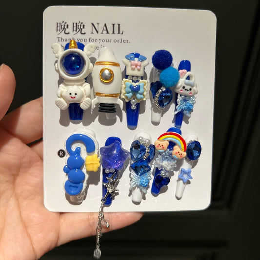 Klein Blue & White Stiletto Press-on Nails with 3D Astronaut, Rocket, Rainbow Bear, Fluffy Ball, and Interlinked Chain - Space Kawaii Fake Nail Set