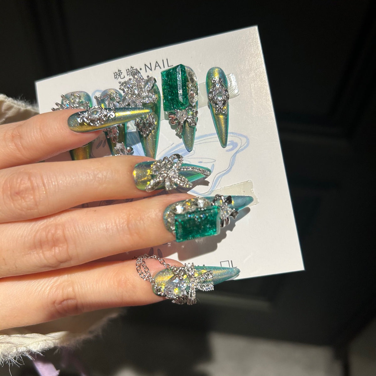 Handmade Green Chameleon Long Stiletto Press On Nails with Emerald Crushed Gem Blocks, Silver Rhinestone Butterfly & Bow Charms, Pearls & Dangling Chains