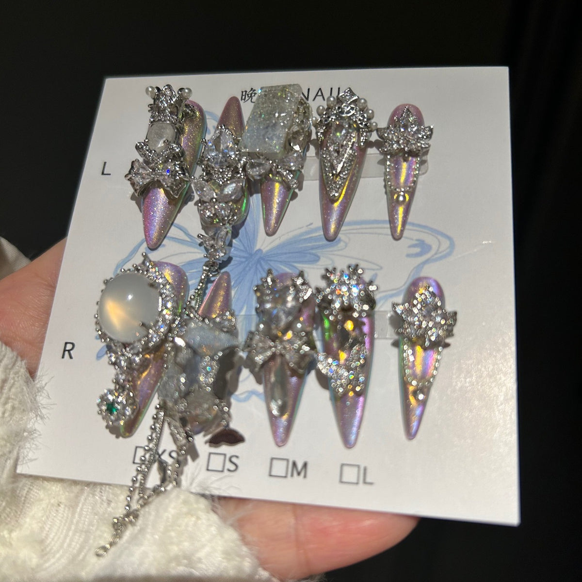 Handmade Iridescent Aurora Long Stiletto Press On Nails with Opal Gem Accents, Silver Rhinestone Bow & Star Charms, Pearls & Long Dangling Chains