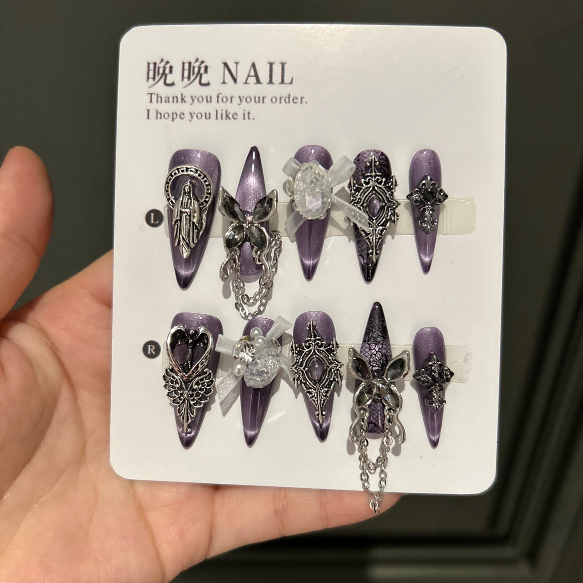 Dark Grey-Purple Cat Eye Stiletto Press-on Nails with Vintage Silver Religious Relief, Lace Pattern, White Ribbon Bow, Butterfly, and Draping Chain - Gothic Glam Fake Nail Set