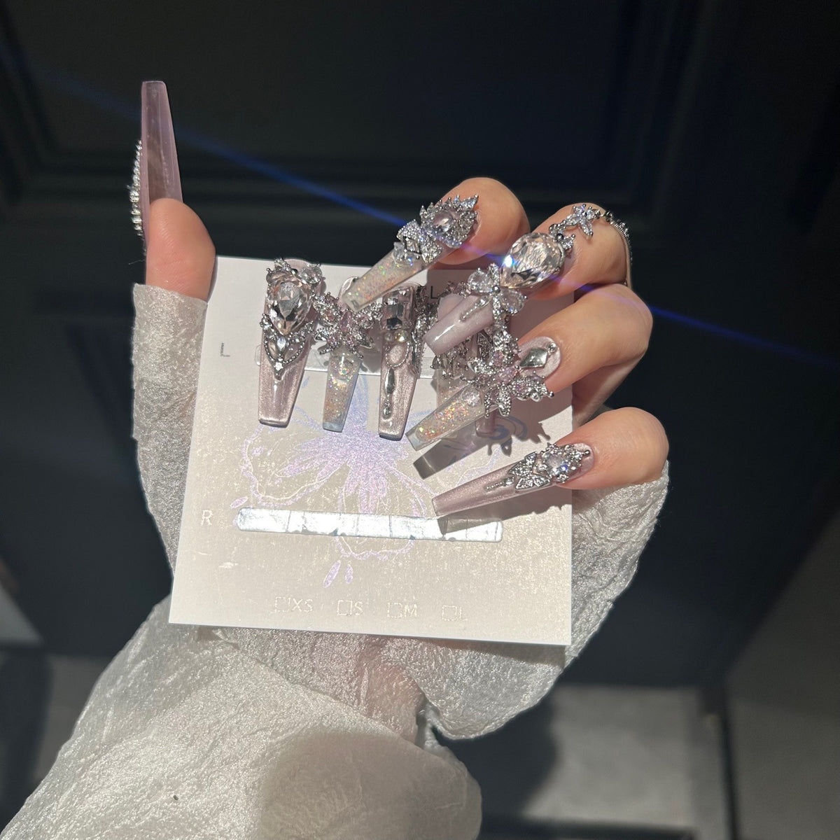 Smoky Pink Cat Eye Coffin Press-on Nails with Over-sized Pink Crystal Gems, Silver Bow, and Hanging Chain - Luxury Glam Fake Nail Set