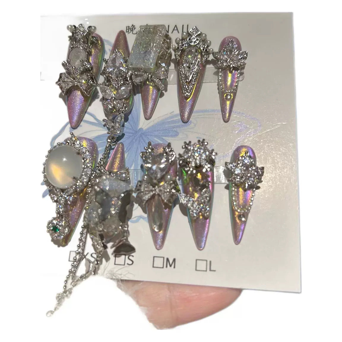 Handmade Iridescent Aurora Long Stiletto Press On Nails with Opal Gem Accents, Silver Rhinestone Bow & Star Charms, Pearls & Long Dangling Chains