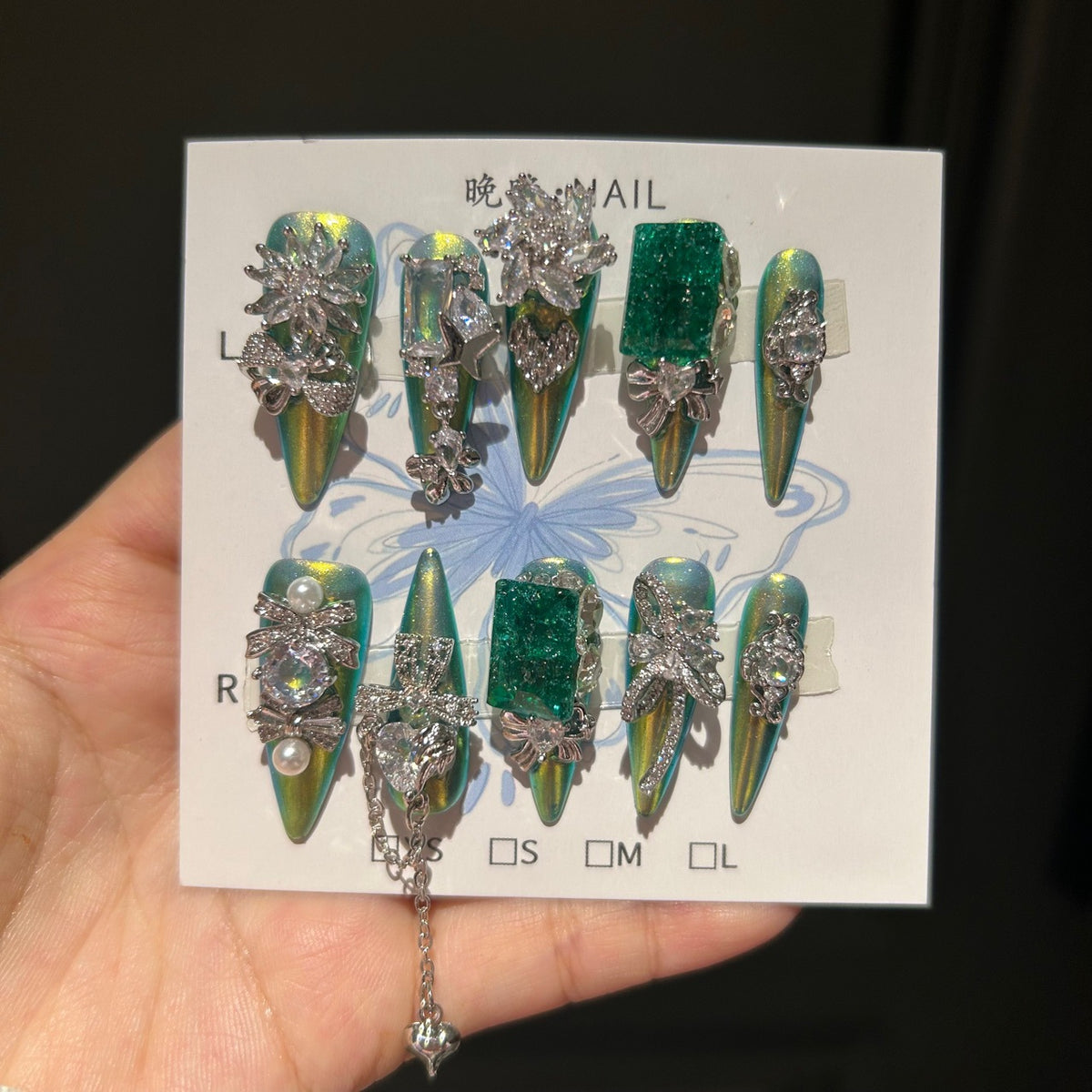 Handmade Green Chameleon Long Stiletto Press On Nails with Emerald Crushed Gem Blocks, Silver Rhinestone Butterfly & Bow Charms, Pearls & Dangling Chains