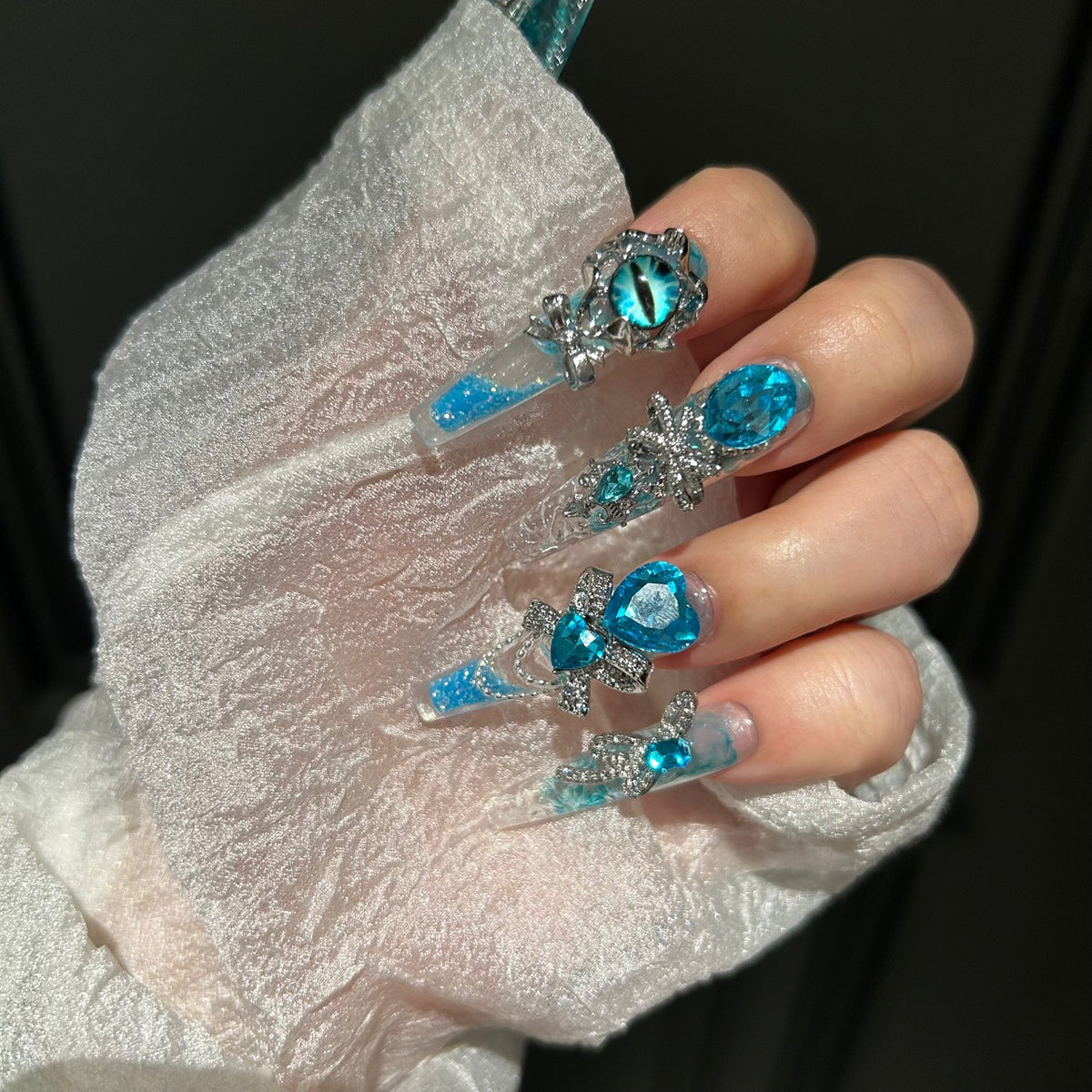 Handmade Blue Glitter Gradient Long Coffin Press On Nails with Blue Evil Eye Charms, Large Blue Heart Crystals, Rhinestone Bows & Silver Chains