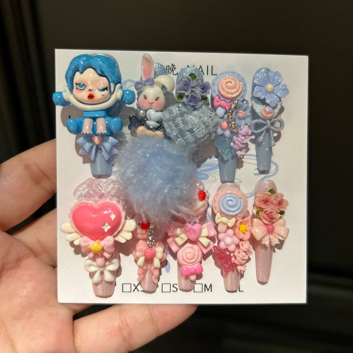 Y2K Blue and Pink Coffin Press-on Nails with 3D Anime Doll, Fluffy Pom-Pom, Lollipop, and Cute Cartoon Charms - Sweet & Cool Fake Nail Set