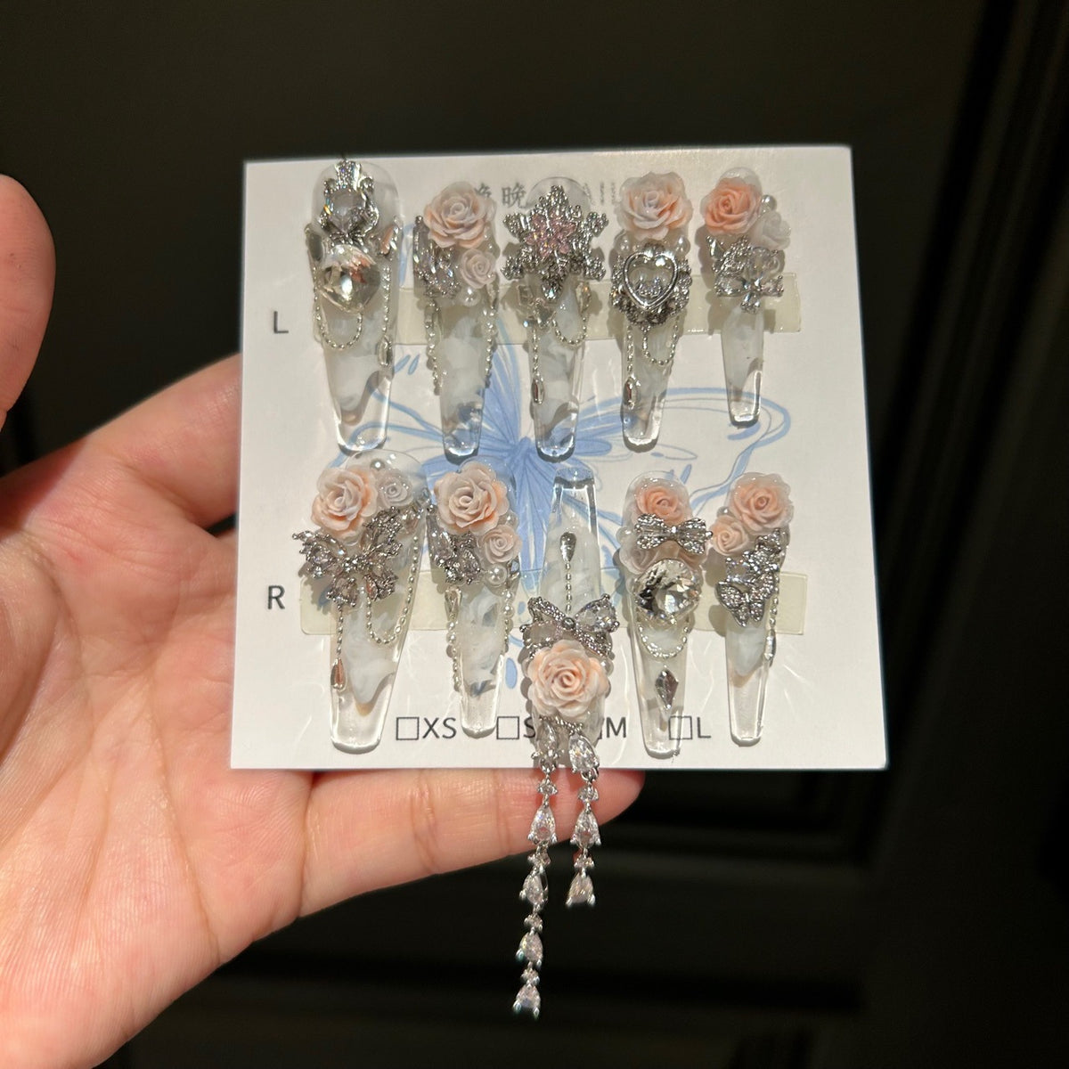 Handmade Clear Marble Long Stiletto Press On Nails with 3D Peach Roses, Silver Rhinestone Butterfly & Bow Charms, Heart Crystals & Dangling Chains