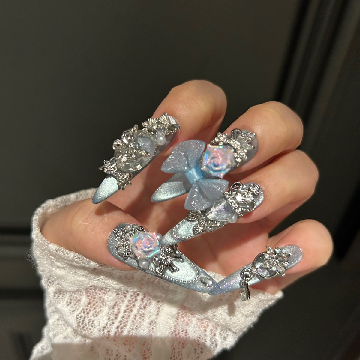Handmade Ice Blue Cat Eye Long Stiletto Press On Nails with Iridescent 3D Roses, Glitter Bows, Butterfly Rhinestones, Pearls & Dangling Silver Chains