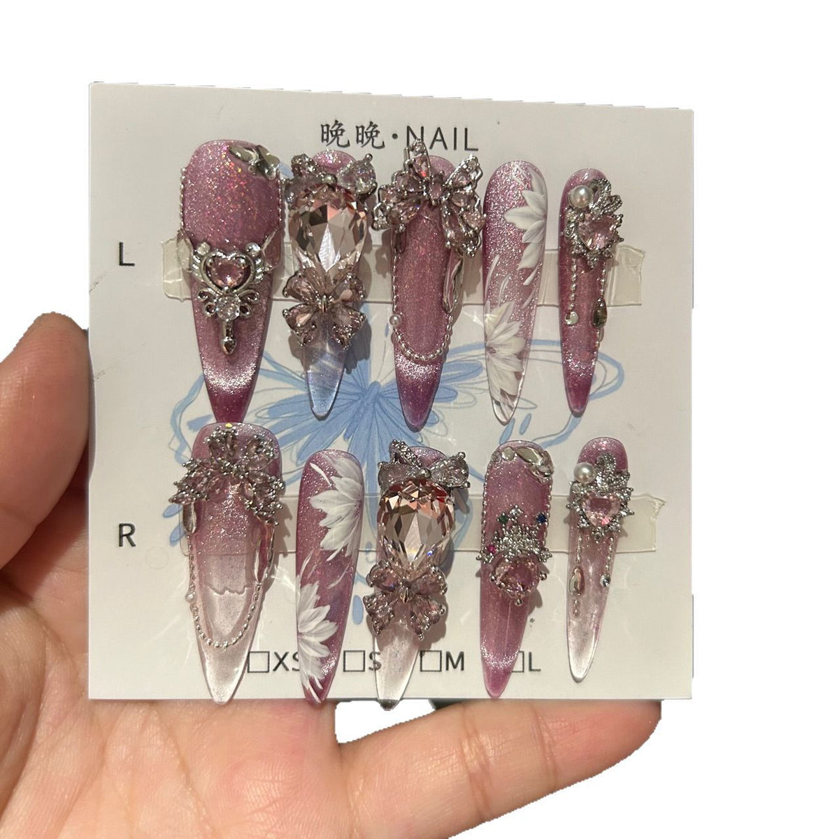 Handcrafted Designer Pink Press-on Nails - Shimmering Cat Eye Base with Intricate 3D Floral, Rhinestones and Chain Drops