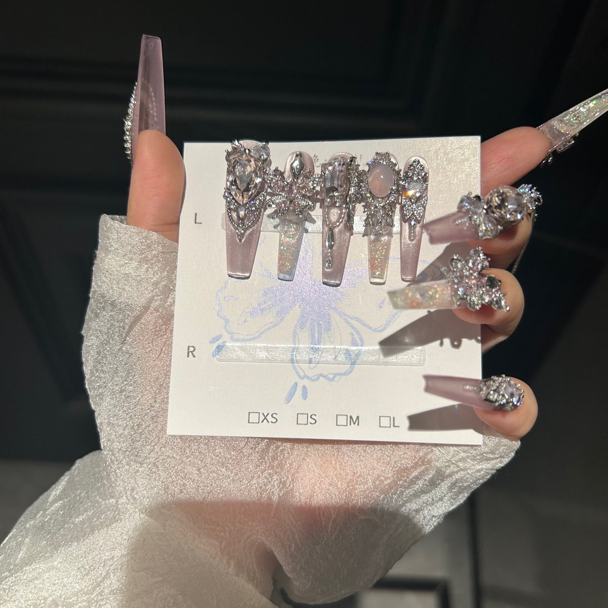 Smoky Pink Cat Eye Coffin Press-on Nails with Over-sized Pink Crystal Gems, Silver Bow, and Hanging Chain - Luxury Glam Fake Nail Set