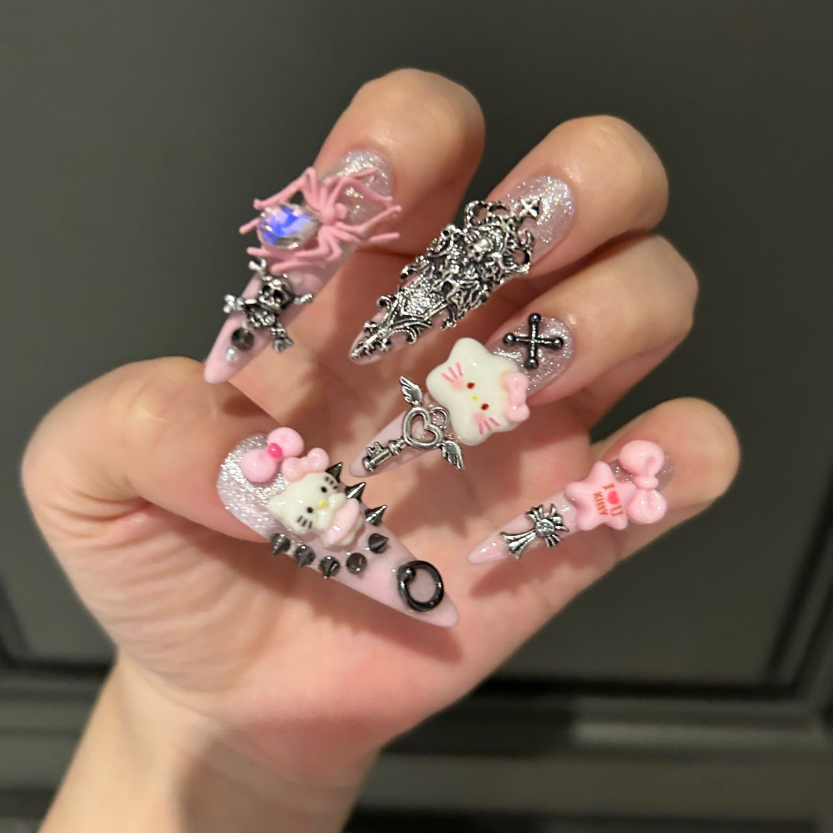 Handmade Pink Gothic Hello Kitty Long Stiletto Press On Nails with Spikes, Cross & Wing Charms