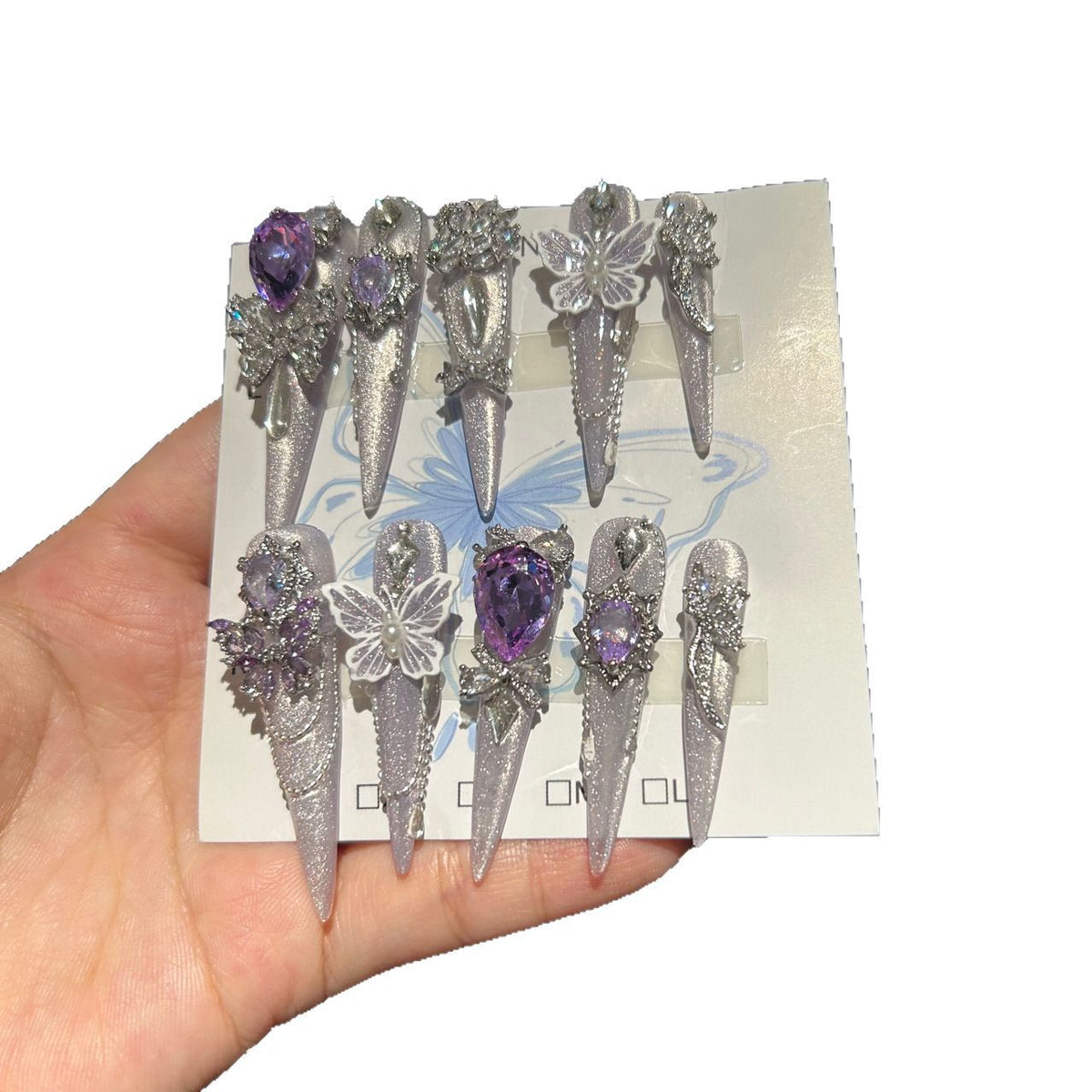 Smoky Purple Cat Eye Stiletto Press-on Nails with Over-sized Purple Crystal, White Bowknot, and Beaded Chain - Luxury Fairy Fake Nail Set