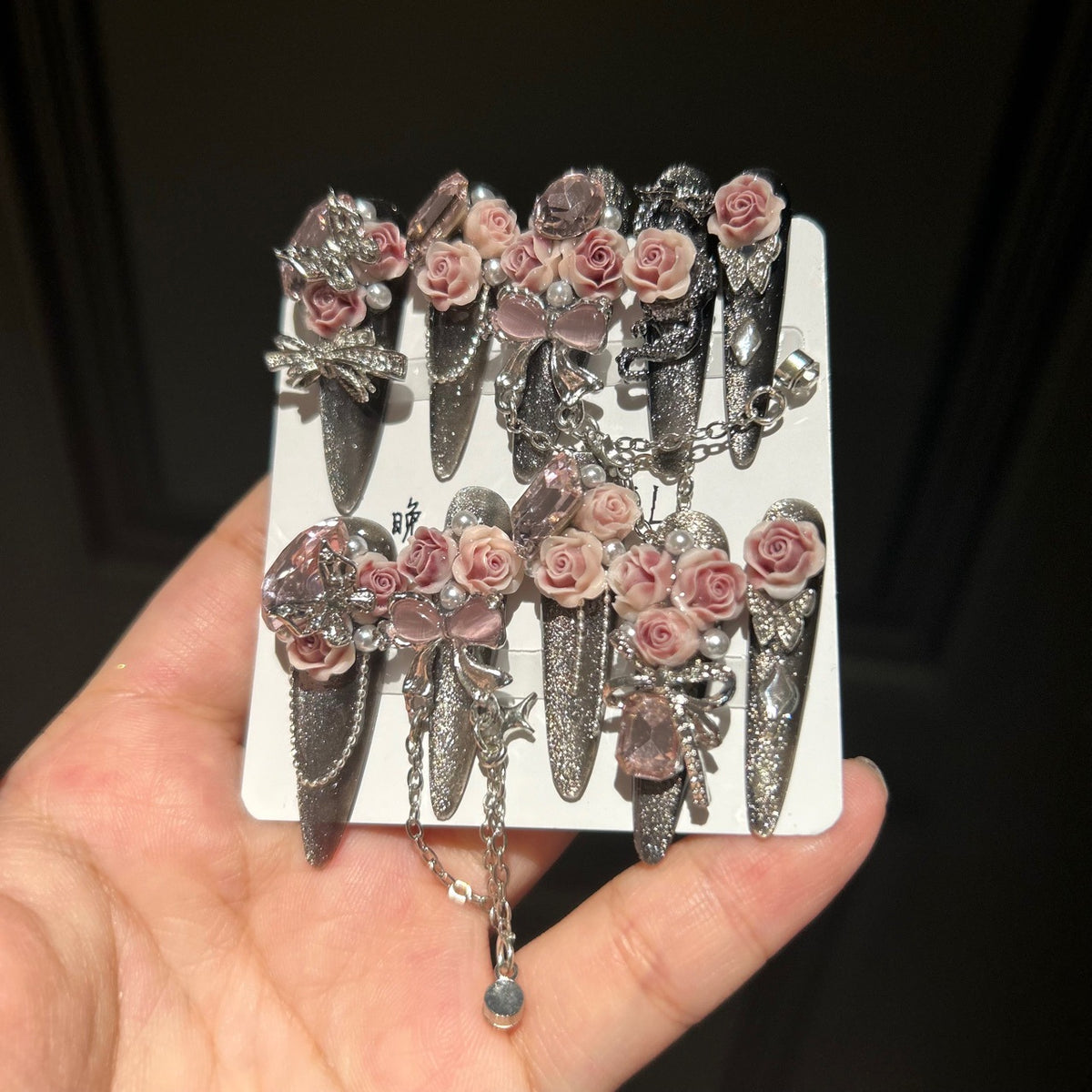 Handmade Dark Glitter Long Stiletto Press On Nails with 3D Dusty Pink Roses, Pink Crystal Charms, Bows, Butterfly Rhinestones & Interlinked Silver Chains