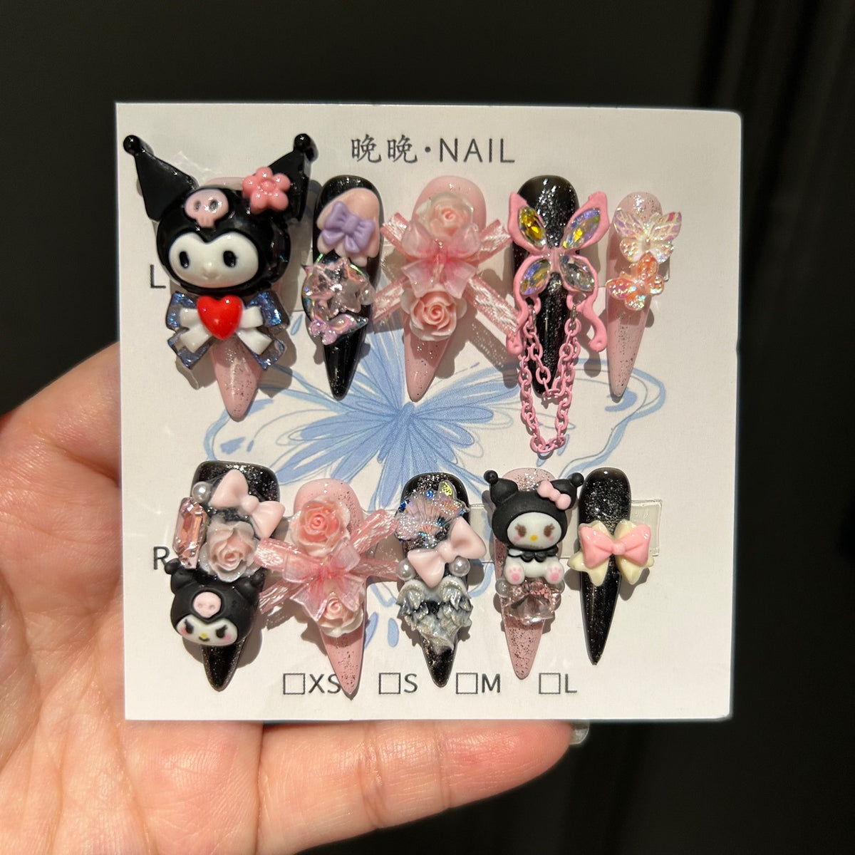 Black & Pink Stiletto Press-on Nails with 3D Kuromi, My Melody, Pink Roses, Iridescent Bow, and Chain Drop - Y2K Sanrio Kawaii Fake Nail Set