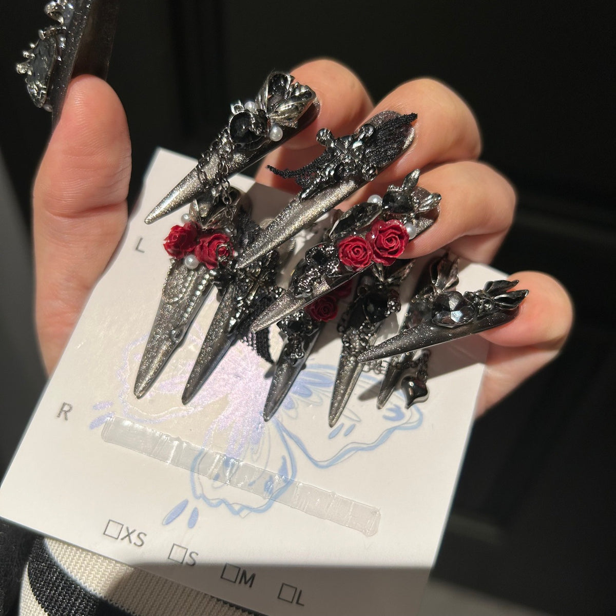 Handmade Silver Glitter Press On Nails, Long Stiletto Gothic Vampire False Nails with 3D Red Roses, Skeleton Hand, Cross & Skull Charms, Black Lace, Pearls, Black Gems & Dangling Metal Chains, Reusable Fake Nails for Cosplay, Halloween & Party