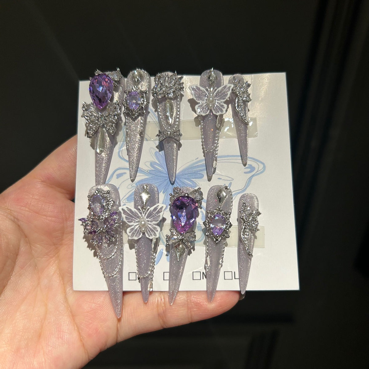 Smoky Purple Cat Eye Stiletto Press-on Nails with Over-sized Purple Crystal, White Bowknot, and Beaded Chain - Luxury Fairy Fake Nail Set