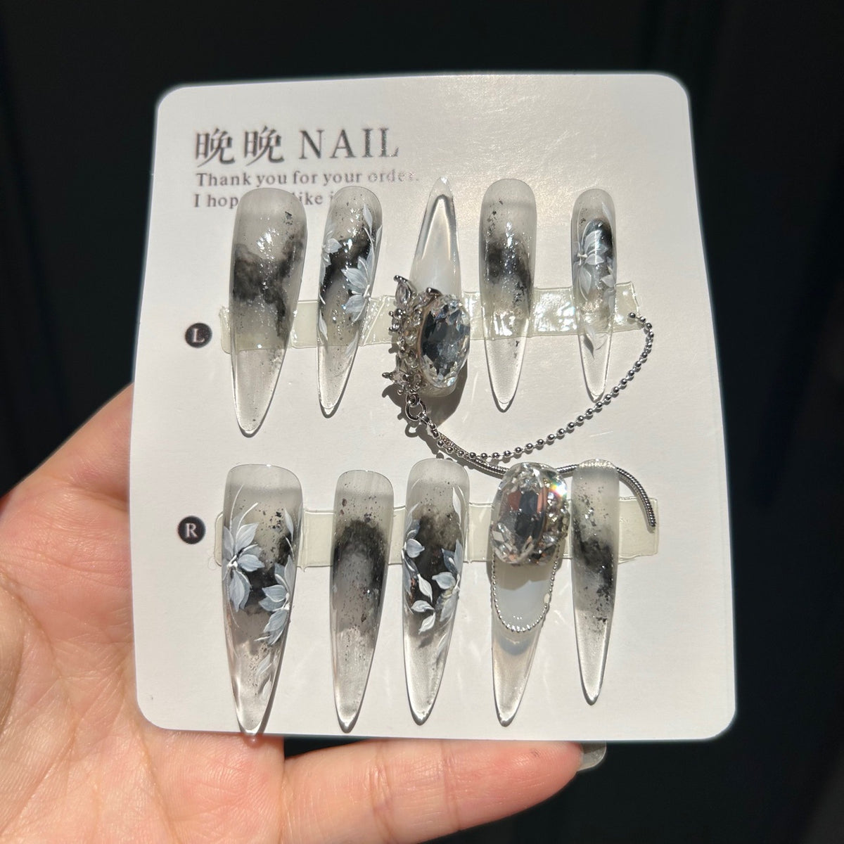 Handmade Ink Wash Black Grey Ombre Long Stiletto Press On Nails with Hand Painted White Flowers, Giant Oval Crystals & Silver Chain Tassels