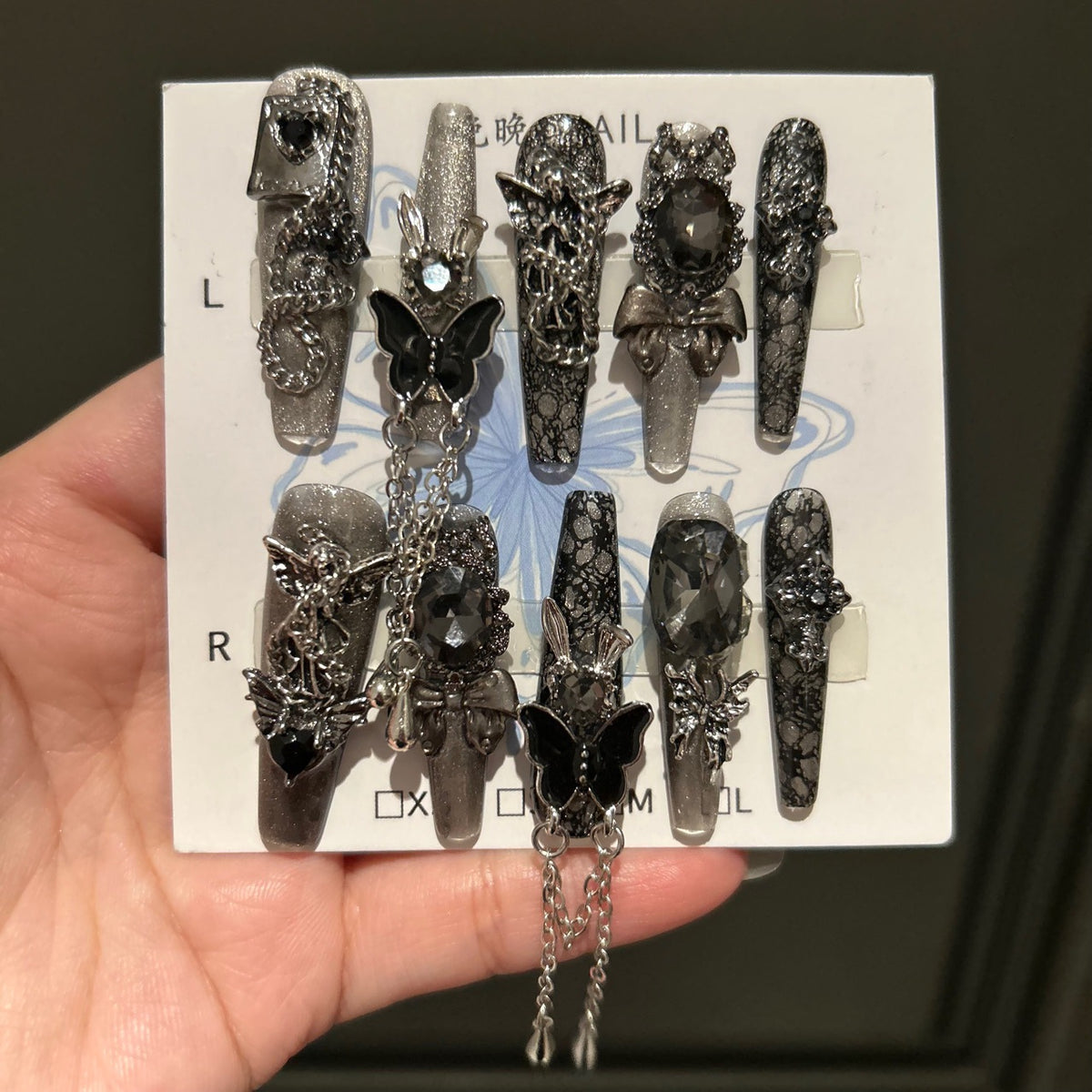 Dark Silver Cat Eye Coffin Press-on Nails with 3D Black Crystal, Lace Texture, Angel, and Hanging Chain Charms - Gothic Glam Fake Nail Set