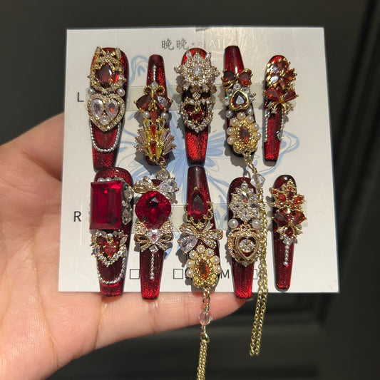 Handcrafted Designer Ruby Press-on Nails - Shimmering Cat Eye Base with Heavy 3D Red Gemstones, Gold Filigree and Chain Drops