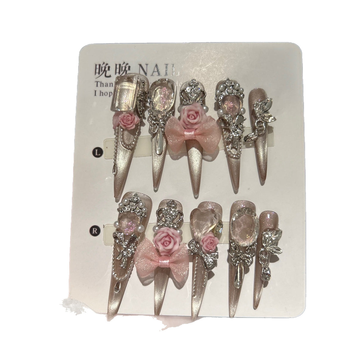 Champagne Nude Cat Eye Stiletto Press-on Nails with Oversized Crystals, 3D Pink Rose, Sheer Bow, Crown, and Crystal Draping Charm - Luxury Glam Fake Nail Set