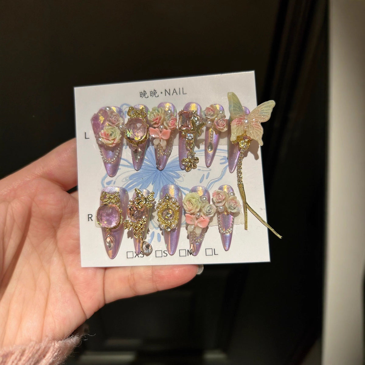 Holographic Purple-Pink Cat Eye Stiletto Press-on Nails with Oversized Fairy Butterfly, 3D Gradient Roses, Vintage Gold Frame, and Draping Chain - Fantasy Glam Fake Nail Set